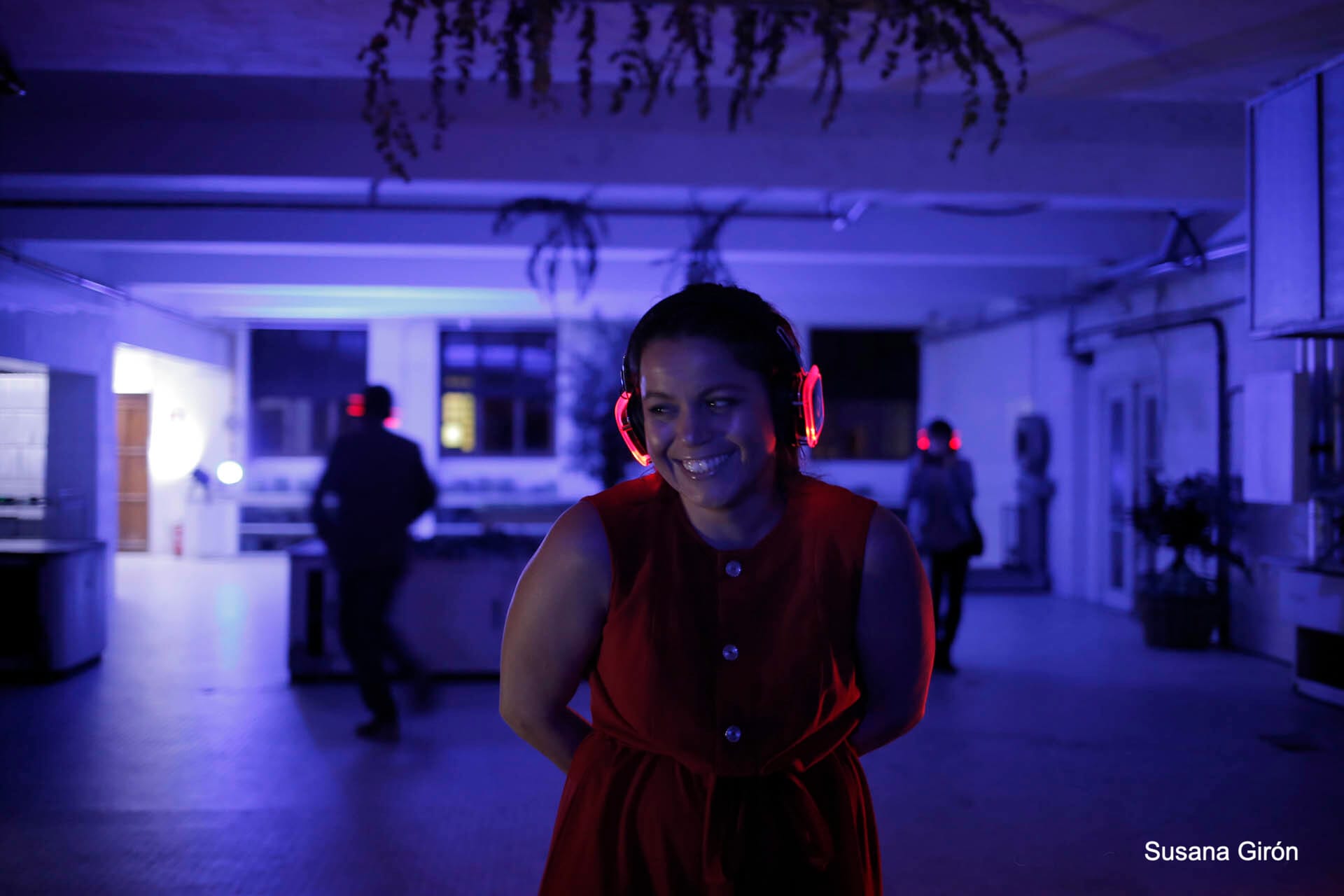 María Moreno wearing wireless headphones in the kitchens of La Laboral, Gijón